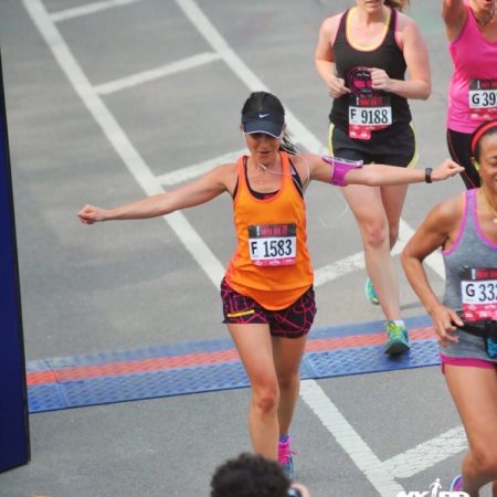 Fitness Blogger Marissa Vicario on running lately -crossing the finish line at a race