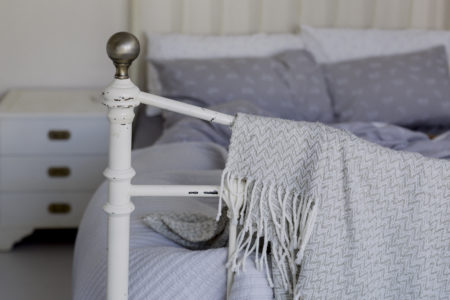 Health Coach Marissa Vicario shares her tips for the fastest way to unwind - cozy bedroom 