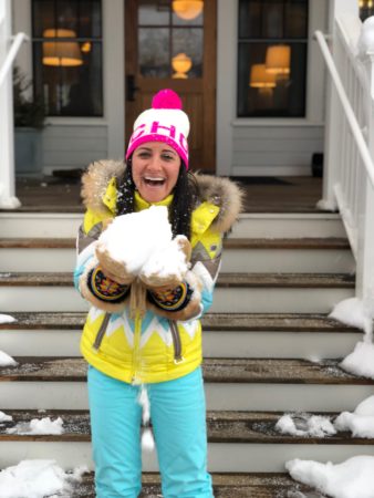 Weekend In Vermont | Marissa Vicario | girl with handful of snow | Kimpton Taconic Inn